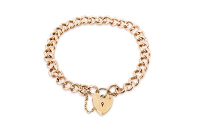 Lot 338 - A 9CT GOLD CURB LINK BRACELET, with padlock...