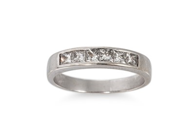 Lot 223 - A SIX STONE DIAMOND RING, mounted in white...