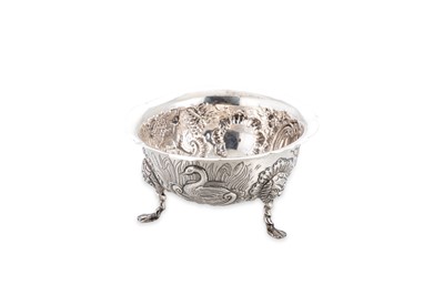 Lot 483 - A PRE-WAR IRISH SILVER SUGAR BOAT, in Rococo...