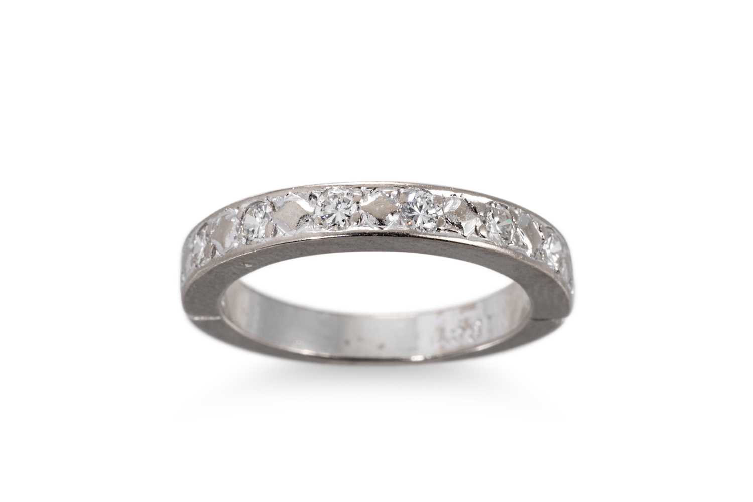 Lot 85 - A DIAMOND HALF ETERNITY RING, mounted in 18ct...