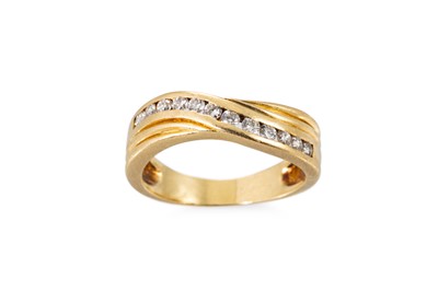 Lot 142 - A DIAMOND SET BAND RING, mounted in 18ct gold,...