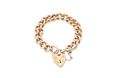Lot 395 - A 9CT YELLOW GOLD CURB LINK BRACELET, padlock...
