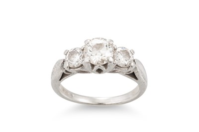 Lot 358 - A DIAMOND THREE STONE RING, mounted in...