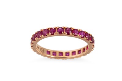 Lot 118 - A RUBY FULL ETERNITY RING, mounted in 14ct...