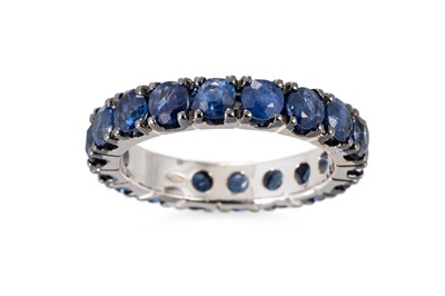 Lot 121 - A SAPPHIRE FULL ETERNITY RING, mounted in 18ct...