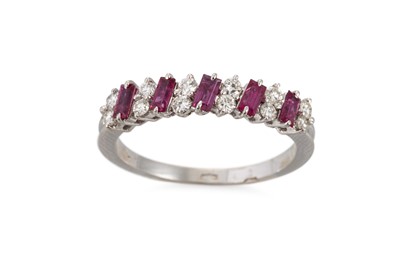 Lot 122 - A VINTAGE RUBY AND DIAMOND BAND RING, the five...