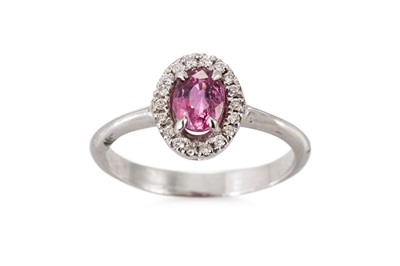 Lot 124 - A TOURMALINE AND DIAMOND CLUSTER RING, the...