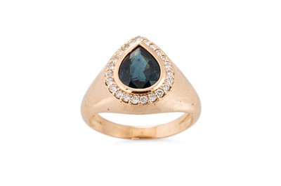 Lot 157 - A DIAMOND AND SAPPHIRE RING, the pear shaped...