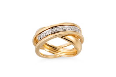 Lot 159 - A DIAMOND SET CROSS-OVER RING, mounted in 18ct...
