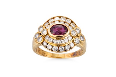 Lot 161 - A RUBY AND DIAMOND CLUSTER RING, the oval ruby...