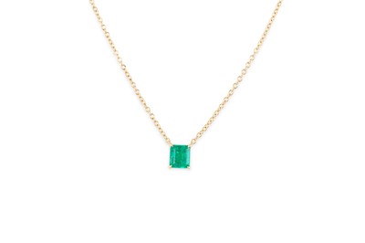 Lot 164 - AN EMERALD PENDANT, the princess cut emerald...