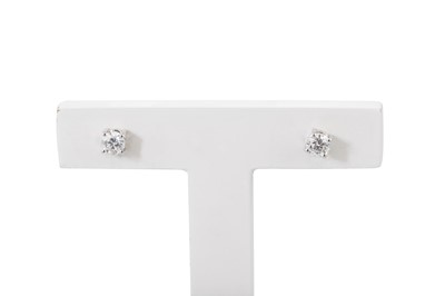 Lot 245 - A PAIR OF DIAMOND STUD EARRINGS, the brilliant...