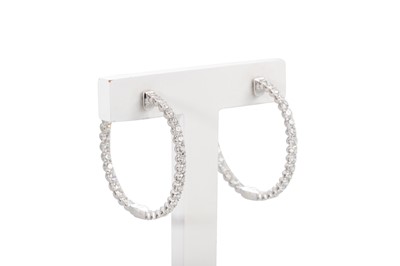 Lot 246 - A PAIR OF DIAMOND SET HOOP EARRINGS, mounted...