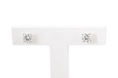 Lot 310 - A PAIR OF DIAMOND STUD EARRINGS, the brilliant...