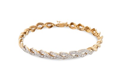 Lot 392 - A 9CT YELLOW GOLD FANCY LINK BRACELET, set...