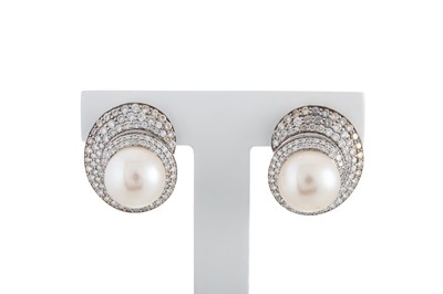 Lot 69 - A PAIR OF PEARL AND DIAMOND CLUSTER EARRINGS,...