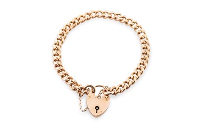 Lot 418 - A 9CT ROSE GOLD FLAT CURB LINK BRACELET, with...