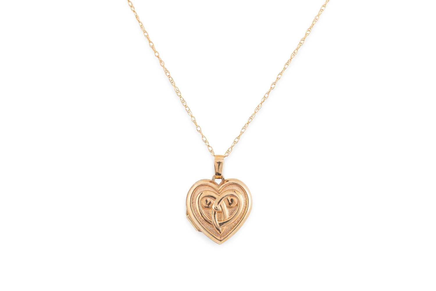 Click H Locket Lot 422 - A 9CT YELLOW GOLD HEART SHAPED LOCKET, to a