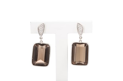 Lot 186 - A PAIR OF SMOKEY QUARTZ AND DIAMOND DROP...