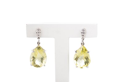 Lot 201 - A PAIR OF PERIDOT AND DIAMOND DROP EARRINGS,...