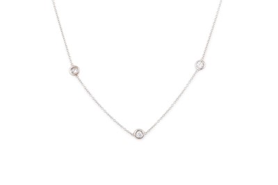 Lot 269 - A DIAMOND NECKLACE, the colet set diamonds...