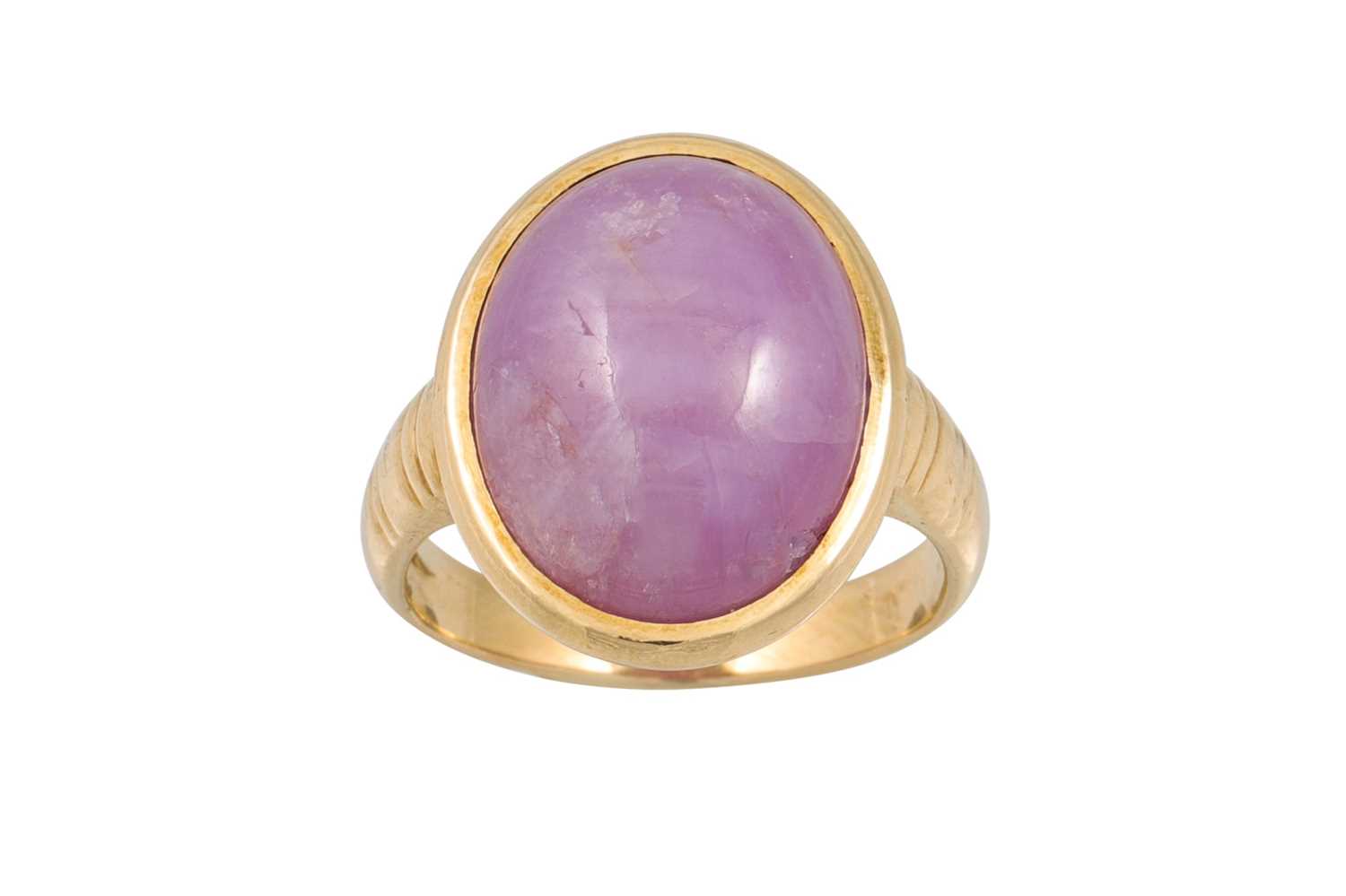 Lot 194 - A CABOCHON RUBY DRESS RING, mounted in 18ct gold