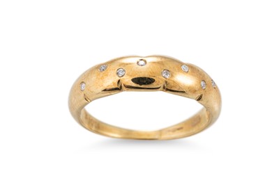 Lot 169 - A 9CT YELLOW GOLD DIAMOND SET BAND RING, 2.7 g....