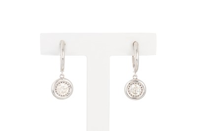 Lot 69 - A PAIR OF DIAMOND DROP EARRINGS, the brilliant...