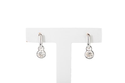Lot 402 - A PAIR OF DIAMOND DROP EARRINGS, the circular...