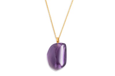 Lot 404 - AN AMETHYST PENDANT, the polished amethysts to...