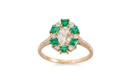 Lot 408 - AN EMERALD AND DIAMOND CLUSTER RING, the oval...
