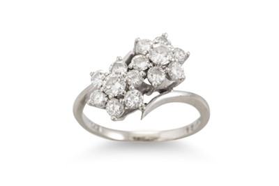 Lot 153 - A DIAMOND DOUBLE DAISY CLUSTER RING, mounted...