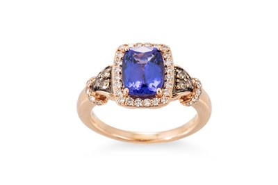 Lot 259 - A TANZANITE AND DIAMOND CLUSTER RING, the...