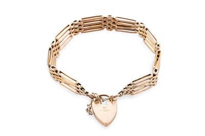 Lot 246 - A 9CT GOLD GATE BRACELET, with padlock clasp,...