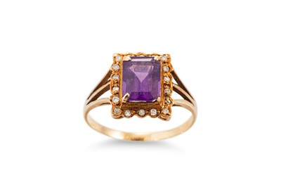 Lot 4 - AN AMETHYST CLUSTER RING, mounted in 14ct...