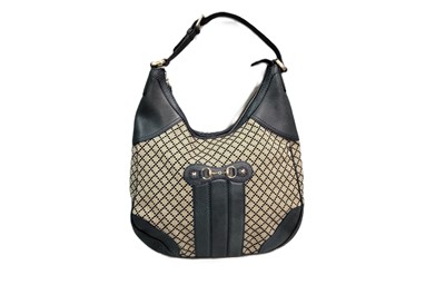 Lot 467 - A GUCCI 'JACKIE' FABRIC & LEATHER HANDBAG, the...