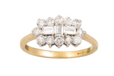 Lot 207 - A DIAMOND CLUSTER RING, set with baguette and...