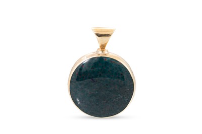 Lot 90 - A LARGE DOUBLE SIDED PENDANT, polished set...