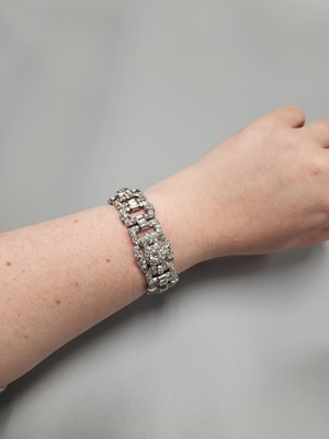 Lot 225 - A DIAMOND SET ART DECO STYLE PANEL BRACELET,...