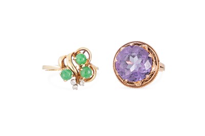 Lot 86 - A DIAMOND AND GEM SET RING, of abstract form...