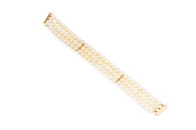 Lot 193 - A VINTAGE THREE STRANDED PEARL BRACELET, to a...