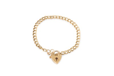 Lot 242 - A 9CT GOLD INGOT PENDANT, together with a 9ct...