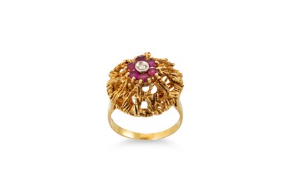 Lot 215 - A RUBY AND DIAMOND CLUSTER RING, mounted in...