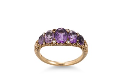Lot 217 - AN 18CT YELLOW GOLD GRADUATED AMETHYST AND...