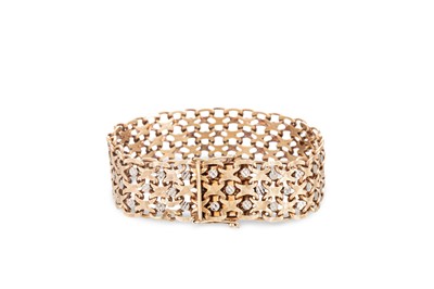 Lot 221 - A 9CT TWO COLOUR GOLD ARTICULATED CUFF...