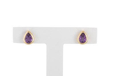 Lot 31 - A PAIR OF AMETHYST STUD EARRINGS, the pear cut...