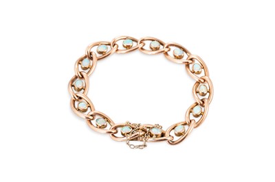 Lot 35 - AN ANTIQUE GOLD & OPAL SET BRACELET, the...