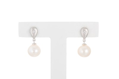 Lot 182 - A PAIR OF DIAMOND AND PEARL DROP EARRINGS, the...