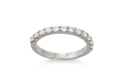 Lot 370 - A DIAMOND HALF ETERNITY RING, mounted in...