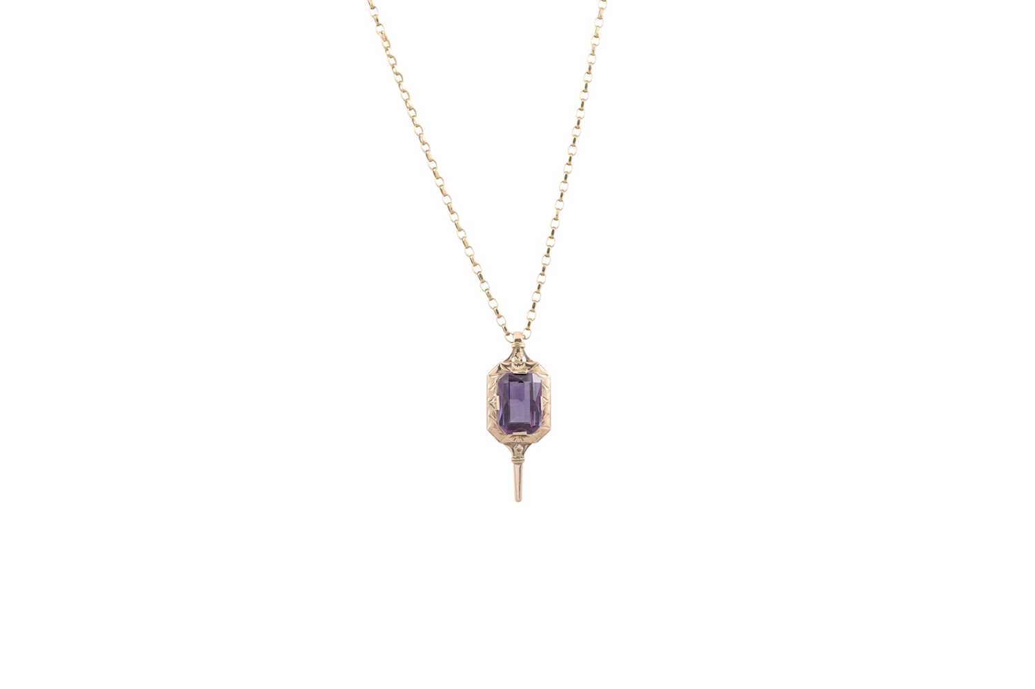 Lot 229 - A VINTAGE STONE SET PENDANT, mounted in 9ct...